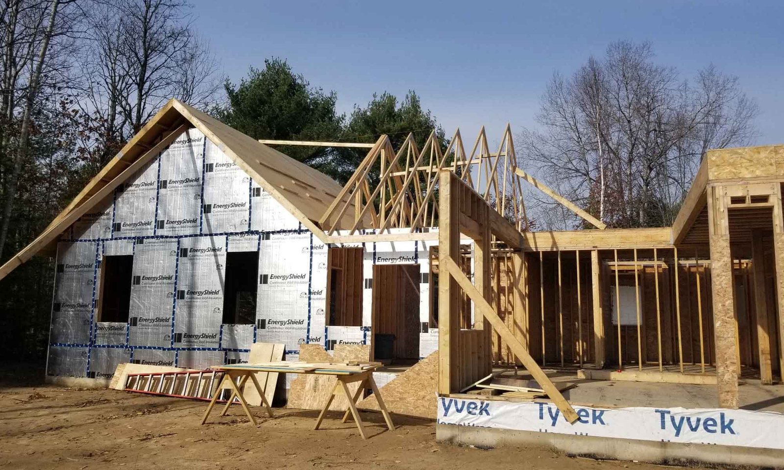 Exterior framing of lakefront custom home under construction in Bancroft, Ontario
