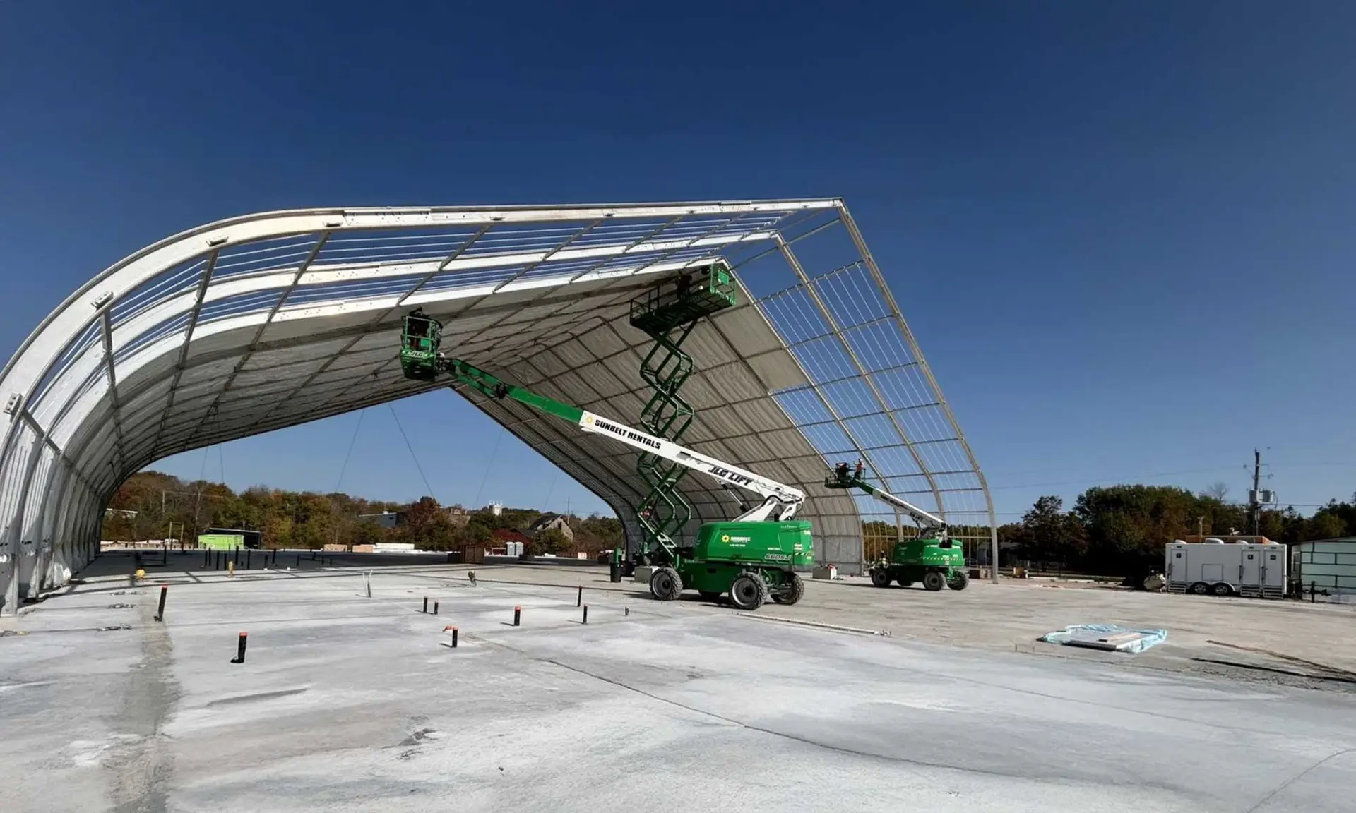 Steel arch structure installation for community arena
